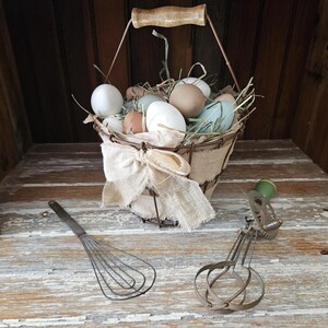 Basket of natural colored chicken eggs.
