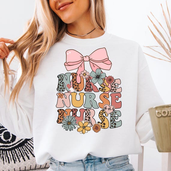 Pink Bow Nurse Retro Floral Sweatshirt, Coquette Gift for Nurse Pullover Crewneck, Cute Nursing Retro Style RN Sweater