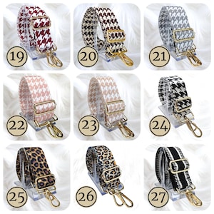 Pode incluir: Cole&ccedil;&atilde;o de al&ccedil;as de bolsa ajust&aacute;veis em v&aacute;rios padr&otilde;es e cores. Os designs incluem padr&atilde;o pied-de-poule, estampa de leopardo e listras. Cada al&ccedil;a tem ferragens de metal dourado e um clipe. Os n&uacute;meros 19-27 s&atilde;o vis&iacute;veis.