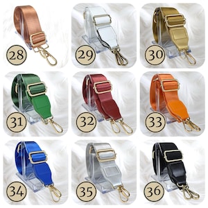 Pode incluir: Cole&ccedil;&atilde;o de al&ccedil;as de bolsa ajust&aacute;veis em v&aacute;rias cores, incluindo cobre, branco, dourado, verde, vermelho, laranja, azul, prata e preto. Cada al&ccedil;a apresenta ferragens de metal dourado e um fecho de clip.