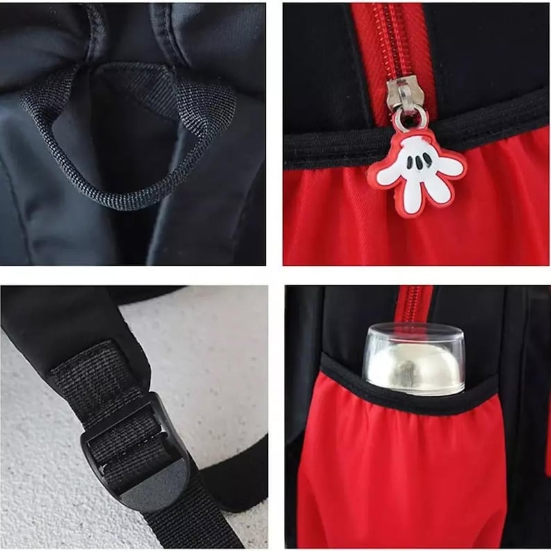 May include: A black and red backpack featuring a top carry handle, adjustable black shoulder straps with plastic buckles, and a side pocket containing a clear bottle. The zipper pull is a white and red cartoon glove shaped charm.