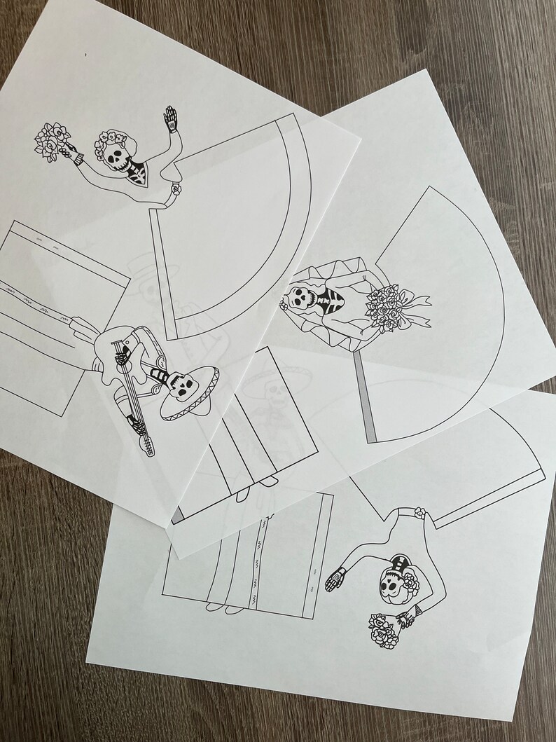 May include: Three printable paper templates featuring black and white illustrations of skeletons dressed in traditional Mexican wedding attire. The skeletons are holding flowers and a guitar.