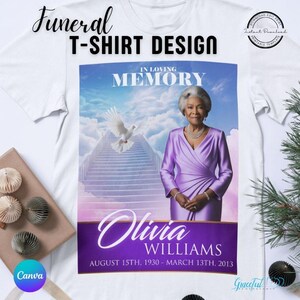 May include: A white t-shirt with a purple and blue design featuring a woman in a purple dress, a white dove, and a stairway to heaven. The text "In Loving Memory" is at the top of the design, and the text "Olivia Williams August 15th, 1930 - March 13th, 2013" is at the bottom.