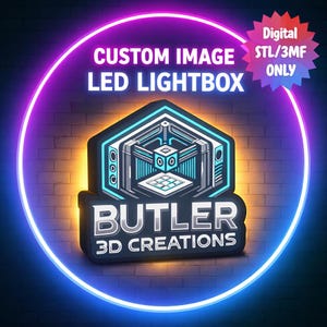 May include: A neon sign promoting a custom image LED lightbox. The sign features a 3D printer graphic and the text "CUSTOM IMAGE LED LIGHTBOX" and "BUTLER 3D CREATIONS". The sign is surrounded by a neon blue and purple circle.