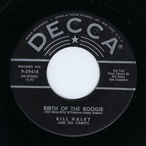 May include: Black and white 7-inch vinyl record with a white label. The record is titled "Birth of the Boogie" by Bill Haley and His Comets. The record number is 9-29418. The record is a Fox Trot with vocal chorus by Bill Haley and Ensemble.