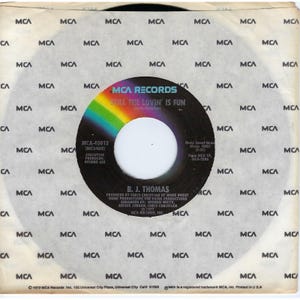 B.J. Thomas 45 Vinyl Record Still The Lovin Is Fun / Play Me A Little Traveling Music MCA VG+ Pop Rock