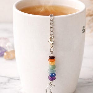 Chakra Teesieb – Kristall Teekugel mit Mond Anhänger