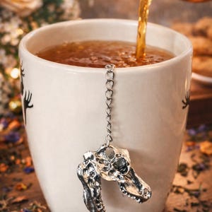 Infusore per tè a forma di teschio di dinosauro / Sfera per tè in acciaio inossidabile con ciondolo T-Rex / Infusore per tè sfuso / Regalo per gli amanti del tè