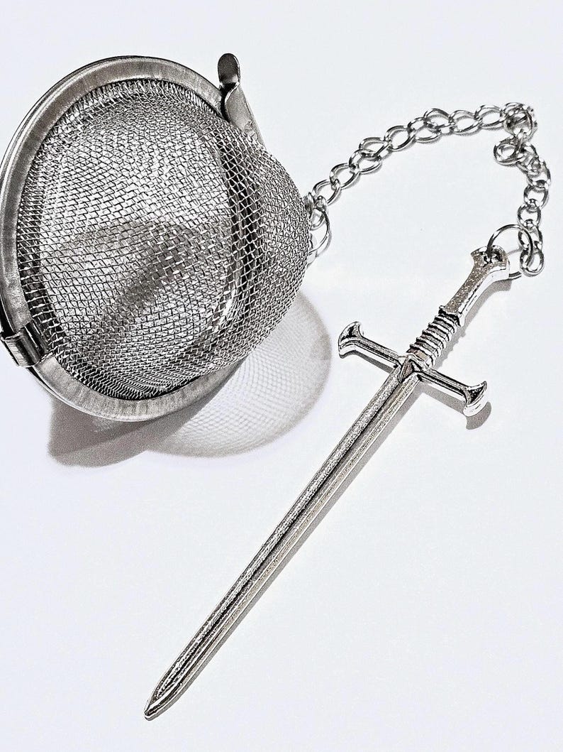 Tea infuser with mesh ball medieval sword charm