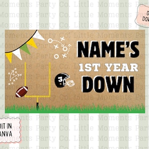 May include: A digital download football-themed party sign with the text "NAME'S 1ST YEAR DOWN." The design includes a football, helmet, goalpost, and decorative elements on a brown background with green grass.