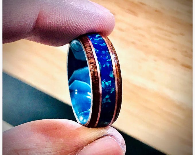 West African Etimoe Wood Ring, Crushed Blue Opal Inlay, Copper Banding, and Blue Swirl Epoxy Core, Bentwood Ring