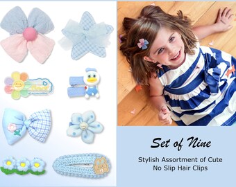 Conjunto de pinzas para el cabello para bebé niña en color azul, con lazos, estrellas y flores.