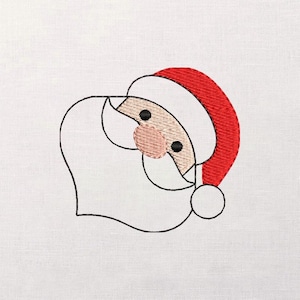 May include: Embroidered Santa Claus face with a red hat, beige face, pink nose, and black eyes. The design is outlined in black thread on a white background. A festive holiday theme.