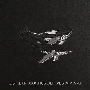 May include: Embroidered design of two whales in black, white, and grey on a black background. The image includes file format extensions at the bottom.
