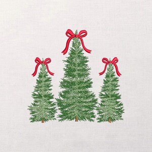 May include: Embroidered design featuring three green Christmas trees, each topped with a bright red bow. The trees are arranged in a row against a white background, creating a festive holiday theme.