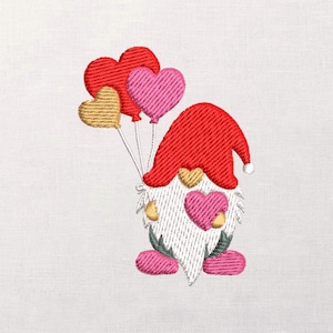 May include: Embroidered gnome holding heart-shaped balloons. The gnome wears a red hat and pink shoes, with a white beard and a heart on its chest. The balloons are red, pink, and gold. The design is on a white background.