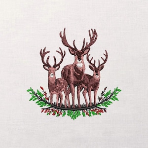 May include: Embroidered design featuring three deer with large antlers, in shades of brown, standing above a green and red floral wreath. The image is set against a white background, creating a rustic and natural aesthetic.