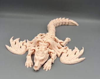 Dragón esqueleto articulado impreso en 3D: juguete sensorial flexible e inquieto