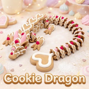 Puede incluir: Una escultura de dragón hecha de galletas en forma de corazón de color marrón claro con bordes de glaseado blanco y detalles rosas. El cuerpo largo y segmentado se curva, terminando en una gran cola en forma de corazón. El texto dice Cookie Dragon.