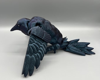 Corbeau articulé imprimé en 3D : figurine de corbeau articulé en titane brûlé