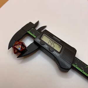 Used a standard 20mm dice for reference.