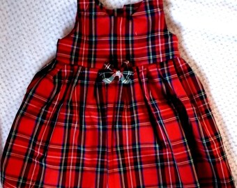 Vestido de Navidad hecho a mano de tartán para niñas con lazo.