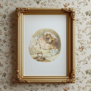 May include: A framed print featuring a charming illustration of a hedgehog in a bonnet and apron, working with a bowl and an iron. The print is set in a gold ornate frame, adding a touch of vintage elegance to the artwork.