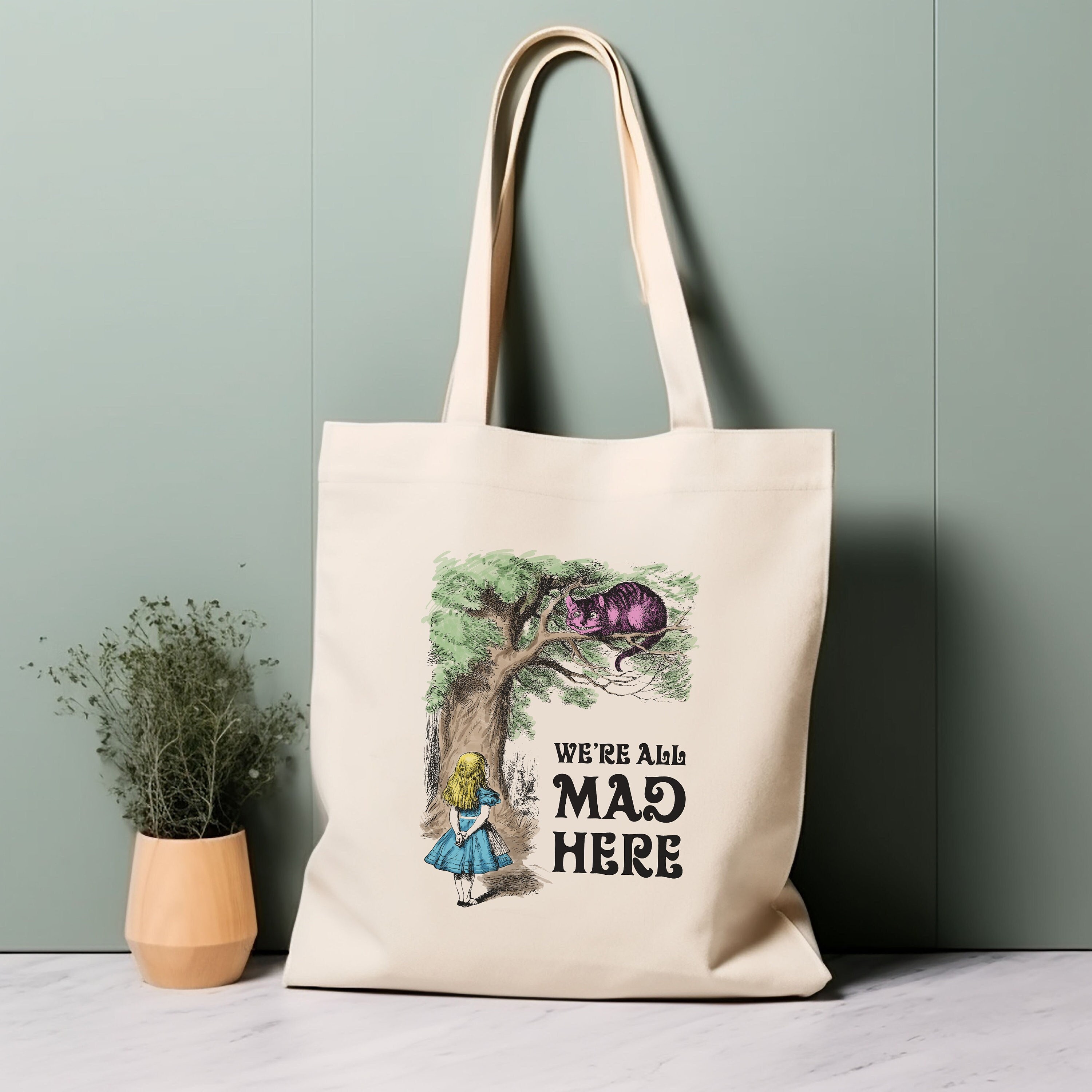 Funny Alice in Wonderland We're All Mad Here Tote Bag by Madame