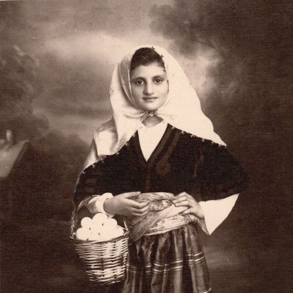 Traditional Peasant Girl Costume. A Young Girl with a Basket of Eggs on Her Arm, Her Shalwar, Belt, Sandals and Headscarf