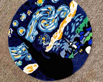 May include: A round rug featuring a design inspired by Van Gogh's "Starry Night" painting. The rug has a dark blue background with swirling blues, yellows, and white accents. The text "tuftplace CUSTOM RUGS" is visible. The rug is on a gray surface.
