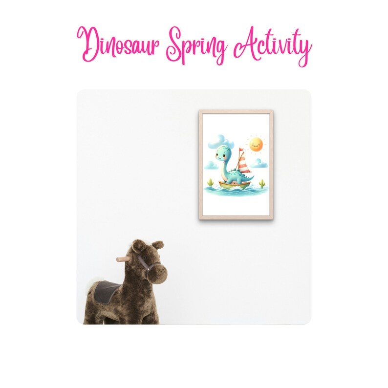 May include: A framed illustration of a green dinosaur on a boat with a red and white sail. The dinosaur is smiling and has a blue body with green spots. The sun is shining in the sky and there are clouds. The illustration is on a white background.