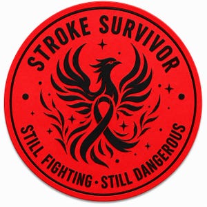 May include: A circular red sticker featuring a black phoenix graphic at the center with a ribbon integrated into its body. The text STROKE SURVIVOR is arched across the top, and STILL FIGHTING STILL DANGEROUS is arched across the bottom in black.