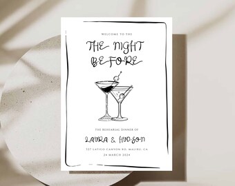 May include: A black and white wedding rehearsal dinner sign. The sign reads "Welcome to the Night Before" above two cocktail glasses. Below the glasses, it reads "The Rehearsal Dinner of Laura & Hudson" with the date and location.