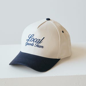 Vintage Sports Hat Two Tone Local Sports Team Embroidered Snapback | Cream and Navy Blue