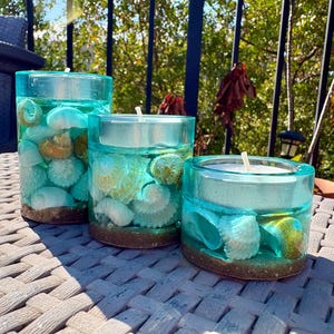 Set of 3 blue seashell resin candle holders