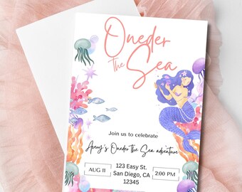 May include: A colourful invitation for a first birthday party with a mermaid theme. The invitation features a mermaid with purple hair and a tail, surrounded by coral, jellyfish, and starfish. The text reads "Oneder the Sea" and includes details about the party, such as the date, time, and location.