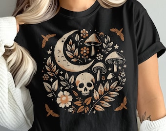 Camiseta de Halloween con colores acogedores de estilo cottagecore, diseño de luna, hongo y calavera