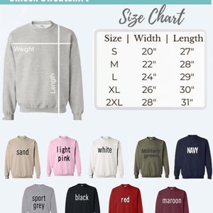 May include: Unisex sweatshirt in various colors, including sand, light pink, white, military green, navy, sport grey, black, red, and maroon. The size chart shows the width and length in inches for sizes S, M, L, XL, and 2XL.