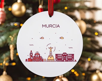 May include: White round ornament with a red ribbon, featuring a line drawing of the Murcia skyline with the word "MURCIA" in red at the top.