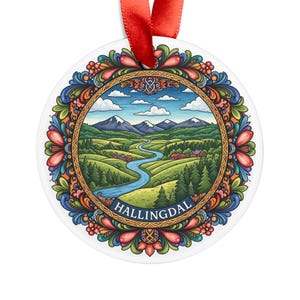 May include: Round ornament with a colorful floral border and a scenic landscape illustration. The image features a river winding through green hills, red houses, and snow-capped mountains under a blue sky. The text "HALLINGDAL" is displayed.