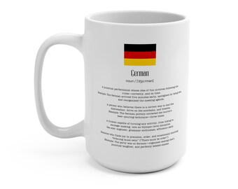 May include: White ceramic mug with a large handle, featuring the German flag and the word "German" in black text. The mug also includes a definition of the word "German" with examples. A perfect gift for anyone.