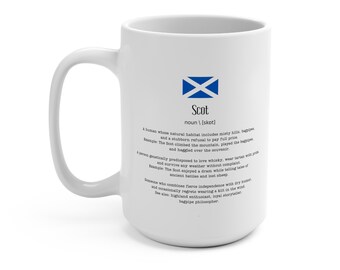 May include: White ceramic mug with a large handle. The mug features the word "Scot" with a definition and the Scottish flag in blue and white. The mug is a standard size.