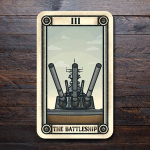 May include: A tarot card illustration featuring a battleship with three large gun barrels. The card is bordered in black and cream, with the Roman numeral III at the top and "THE BATTLESHIP" at the bottom.