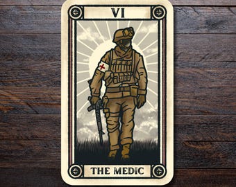 May include: A tarot card illustration featuring a soldier in combat gear, labeled "THE MEDIC" at the bottom and "VI" at the top. The card has a beige border with decorative corner elements and a background of a cloudy sky with sun rays.