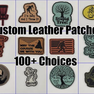 May include: A collection of custom leather patches with various designs, including disc golf themes, a skull, a Bigfoot, and humorous phrases. The text "Custom Leather Patches" and "100+ Choices" are also visible.