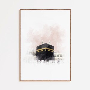 May include: A watercolor painting of the Kaaba in Mecca, Saudi Arabia. The Kaaba is a cube-shaped building that is the holiest site in Islam. The painting is done in a soft, muted palette of pink and white.