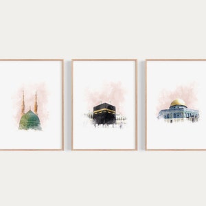 May include: Three watercolor paintings of Islamic architecture. The first painting shows a green dome with two minarets. The second painting shows the Kaaba, a black cube-shaped building. The third painting shows a blue dome with a golden top.