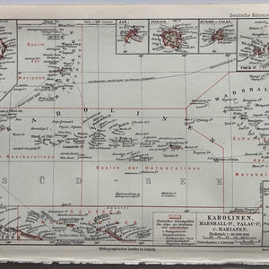 May include: A vintage map of German colonies in the South Pacific, showing the islands of Palau, the Carolines, the Marshalls, and the Marianas. The map is printed in black and red ink on a white background. The map includes the text "Deutsche Kolonien in der Südsee" and "Karolinien, Marshall-1, Palau-1, u. Marianen."