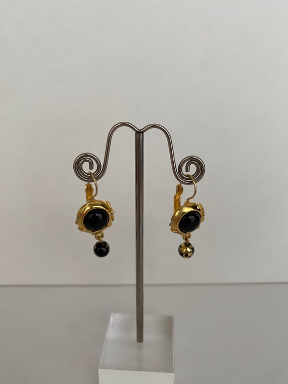 Black and gold-tone earrings - image 1