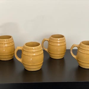 Set of 4 mustard yellow stoneware mugs